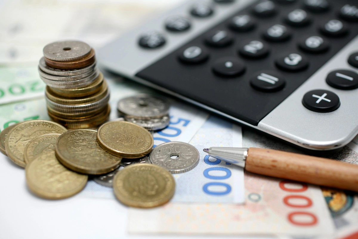 Opsiger du ikke lån før refinansiering, kan kurstab og kursskæring koste hundredtusinder af kroner. Foto: Colourbox