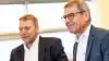Adm. direktør i LMO, Jan Winther, (i forgrunden), og LMO-formand Nis Kristian Hjort, (i baggrunden af billedet), glæder sig begge over noget nær et fantastisk år i LMO, hvor omsætningen satte ny rekord, og hvor der kan udloddes ekstra stort overskud til medlemmerne.