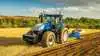 Traktorstatistikken for juni 2026 viser en markant tilbagegang i nyregistreringerne, men New Holland holder sig fortsat i toppen af markedet. Mærket blev månedens mest solgte i 40 hk-segmentet og deler samtidig førstepladsen for årets første seks måneder med John Deere. Arkivfoto.