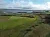 Luftfoto af Nørkær Å, hvor et lodsejerinitiativ er blevet realiseret med genslyngning af åen og etablering af nye naturarealer.