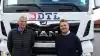 Ulrik Eriksen, kørselsleder, DTL A/S, (tv), og Frank Albert Nissen, MAN Truck & Bus Padborg, foran den nye specialfremstillede transportbil, der er produceret i Holland. Foto: John Ankersen