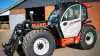 Manitou MLT741-140 V+ kan mønstre en løftehøjde på 6,900 mm og en rækkevidde på 3,930 mm. Den har en kapacitet på 4,100 kilogram.